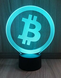 Verlichte Bitcoin-lamp op houten achtergrond.