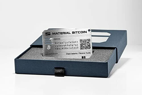 Materiaal Bitcoin kaart in een doos.